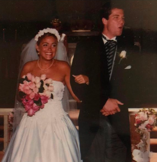 Micah Ohlman with his beautiful wife Colleen Ohlman at their wedding day on June 27, 1999.